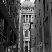 Buy canvas prints of Canon Aly and St Pauls Cathedral in London - Monochrome by Angelo DeVal