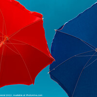 Buy canvas prints of Red and Blue Beach Umbrellas by Angelo DeVal