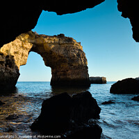 Buy canvas prints of Albandeira Rocky Arch Scene from the Cave by Angelo DeVal