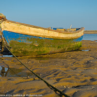 Buy canvas prints of Old Wooden Fishing Boat in Algarve by Angelo DeVal