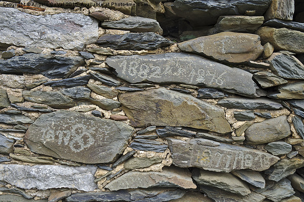 Old schist wall with several dates from the 19th c Picture Board by Angelo DeVal