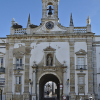 Buy canvas prints of Faro Historic centre Arco da Vila gate. Portugal  by Angelo DeVal