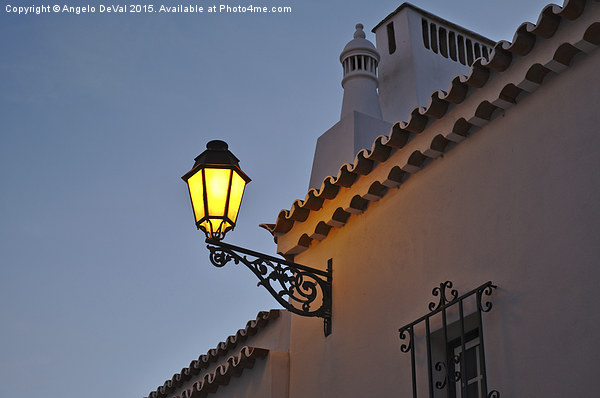 Warm Glow of Algarve Street Lamp Picture Board by Angelo DeVal