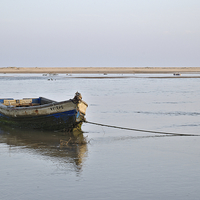 Buy canvas prints of Fishing boat and low tide  by Angelo DeVal