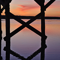 Buy canvas prints of Wooden Bridge Silhouette at Dusk by Angelo DeVal