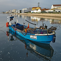 Buy canvas prints of Docked Fishing Boat in Algarve by Angelo DeVal