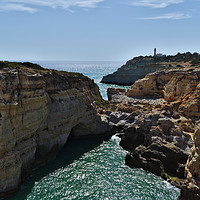Buy canvas prints of Carvoeiro lighthouse and cliffs by Angelo DeVal