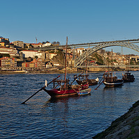 Buy canvas prints of View of Douro river and boats in Porto by Angelo DeVal