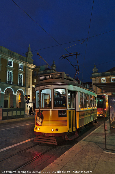 Electrico at night in Terreiro do Paco Picture Board by Angelo DeVal
