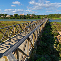 Buy canvas prints of Sunny day and wooden bridge of Quinta do Lago by Angelo DeVal