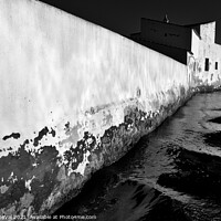 Buy canvas prints of Tidal Mill Wall in Olhao by Angelo DeVal