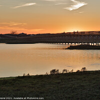 Buy canvas prints of Wooden bridge of Quinta do Lago at Sunset Time by Angelo DeVal