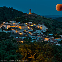 Buy canvas prints of Almonaster La Real and Blood Moon by Angelo DeVal