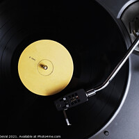 Buy canvas prints of The Nostalgic Sounds of a Yellow Label Vinyl Recor by Angelo DeVal