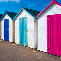 Buy canvas prints of Colorful wooden beach huts by Beata Aldridge