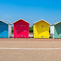 Buy canvas prints of Colorful wooden beach huts in Eastbourne by Beata Aldridge