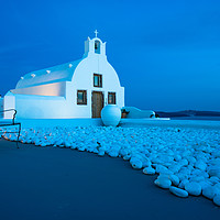 Buy canvas prints of Whitewashed church in Oia at dusk. by Beata Aldridge