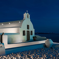 Buy canvas prints of Whitewashed church in Oia at dusk. by Beata Aldridge
