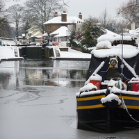 Buy canvas prints of  Canal Boats in Winter by Terry Hunt