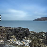 Buy canvas prints of Lighthouse at Sea by Kevin Clelland
