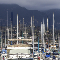 Buy canvas prints of  Sunny Harbor - Cloudy Mountain by Shawn Jeffries