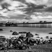 Buy canvas prints of  Llandudnp Pier in Black and White  by Chris Evans