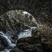 Buy canvas prints of Waterfall View through a Bridge  by Chris Evans