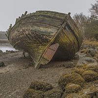 Buy canvas prints of Old Wreck in Dulas Bay  by Chris Evans