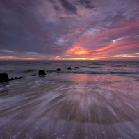 Buy canvas prints of  Wavey Sunrise by Rob Woolf