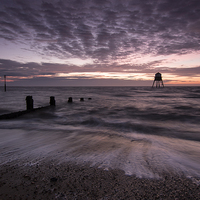 Buy canvas prints of Dovercourt Sunrise by Rob Woolf