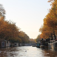 Buy canvas prints of Amsterdam Canal. by Adele Crittenden