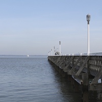 Buy canvas prints of A pier on a bright morning. by Adele Crittenden