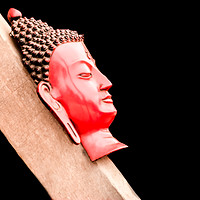 Buy canvas prints of A head shot of hand made buddha on a wood in Kathm by Nabaraj Regmi