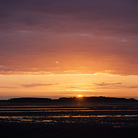 Buy canvas prints of Hilbre Island Sunset Silhouette by David Chennell