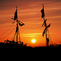 Buy canvas prints of Pirate Ship Sunset  by David Chennell