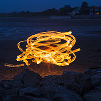 Buy canvas prints of Dancing With Fire  by David Chennell