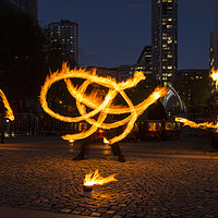 Buy canvas prints of Fire Spinning  by David Chennell