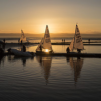Buy canvas prints of Serene Sundown Sailing by David Chennell