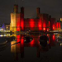 Buy canvas prints of Caernarfon Castle Relection  by David Chennell