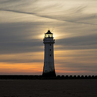 Buy canvas prints of Perch Rock Lighthouse Glow  by David Chennell