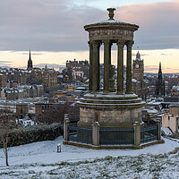 Buy canvas prints of Snowy view over Edinburgh Castle at Sunrise by Miles Gray