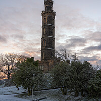 Buy canvas prints of A snow covered Calton Hill looking over the Nelson Monument by Miles Gray