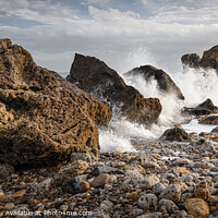 Buy canvas prints of Wave Crashing Over Rocks by Ray Pritchard