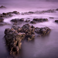 Buy canvas prints of Rocks in the Sea by Ray Pritchard
