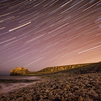 Buy canvas prints of  Star Trails over Target Rock by Ray Pritchard