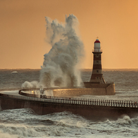 Buy canvas prints of Big Wave at Roker Lighthouse by Ray Pritchard