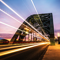 Buy canvas prints of Newcastle Light Trails at Sunrise by Ray Pritchard