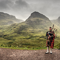 Buy canvas prints of Lone Piper at Glen Coe by Ray Pritchard