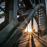 Buy canvas prints of Sun Through the Tyne Bridge by Ray Pritchard