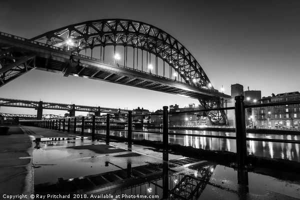 Tyne Bridge and a Puddle Picture Board by Ray Pritchard